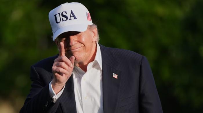 Trump ‘holds off’ Iran strike but warns military to stay ready