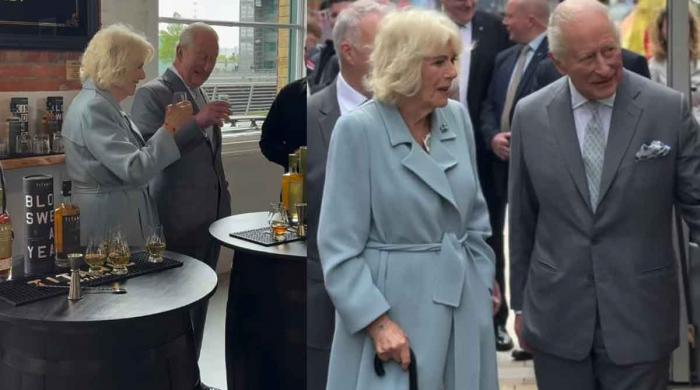 King Charles drinks and dances in Belfast 