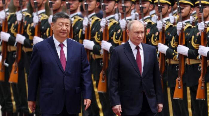 Xi welcomes ‘old friend’ Vladimir Putin in Beijing and secures major agreements