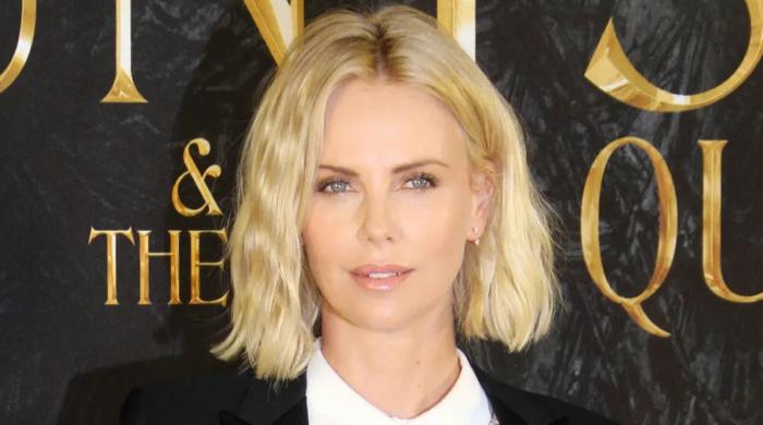 Charlize Theron wishes to revisit the past 