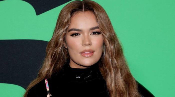 Karol G lives 'legend moment' in her career at 2026 AMAs