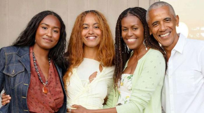 Michelle Obama talks about daughter Malia's work ethics: 'She doesn't want us around her stuff'