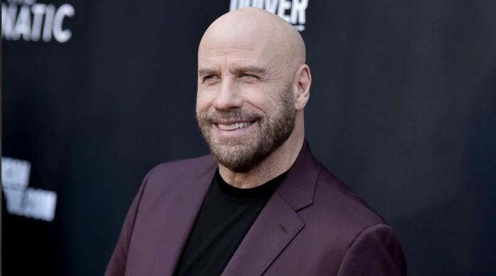 John Travolta shares emotional message as his first directed movie stays No. 1 worldwide