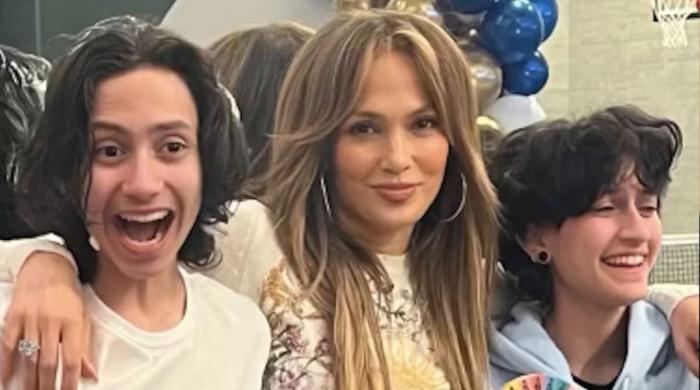 Jennifer Lopez tears up at son Max's graduation