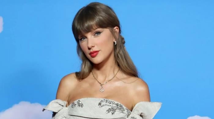 Taylor Swift cheers on Knicks in coordinated t-shirt during NBA final