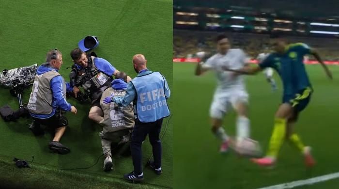 Uzbekistan defender Khusanov collides with camera operator in World Cup opener