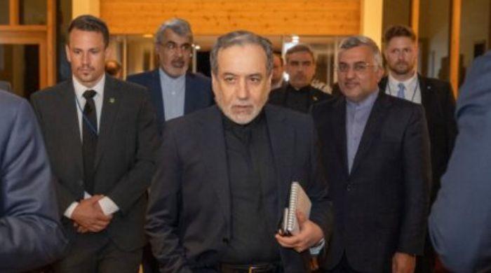 High-stakes US-Iran talks to begin in Switzerland as Tehran claims Strait of Hormuz is closed