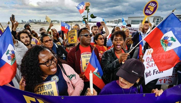 Trump gets supreme court approval to end protected status for Haitian and Syrian immigrants