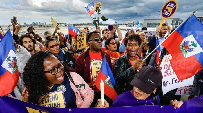 Trump gets supreme court approval to end protected status for Haitian and Syrian immigrants  