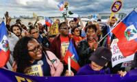 Trump gets supreme court approval to end protected status for Haitian and Syrian immigrants  