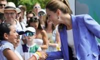 Kate Middleton rubs shoulders with sports icon at Wimbledon after William joins King and Queen