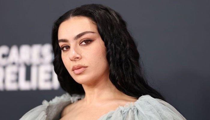 Charli XCX gets honest about feeling like an ‘outsider’ growing up