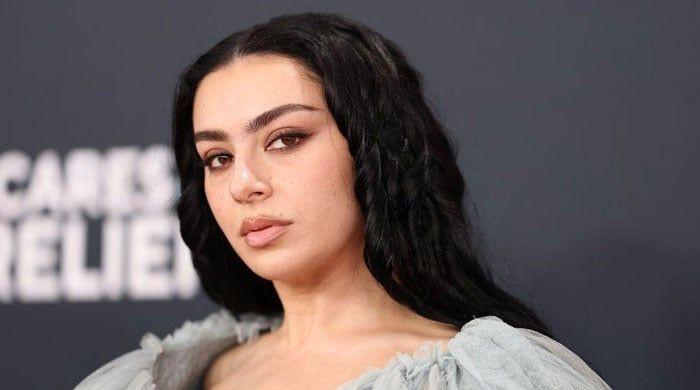 Charli XCX gets honest about feeling like an ‘outsider’ growing up