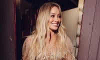 Hilary Duff reacts to fan defending her tour outfits