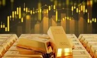 Gold rally lifts TSX futures as US rate-hike bets ease
