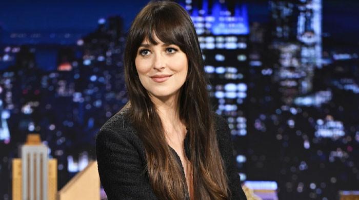 Dakota Johnson spotted leaving for Taylor Swift wedding without boyfriend  