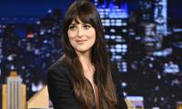 Dakota Johnson spotted leaving for Taylor Swift wedding without boyfriend  
