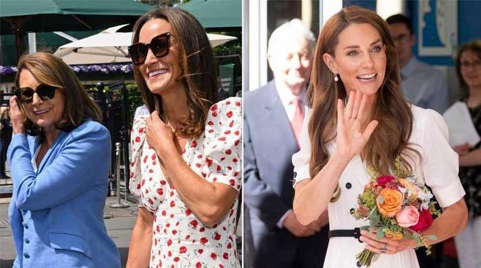 Tennis legend sits with Princess Kate's mother and sister at Wimbledon