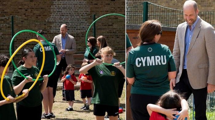 Prince William kicks back at Welsh school with tiny tots: Watch