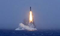 China carries out rare Pacific ballistic missile test, raising regional tensions