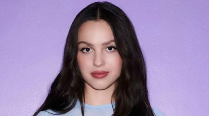 Why Olivia Rodrigo loves writing 'sad' songs?