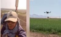 Indonesian Farmer Goes Viral For Riding A Drone To Work