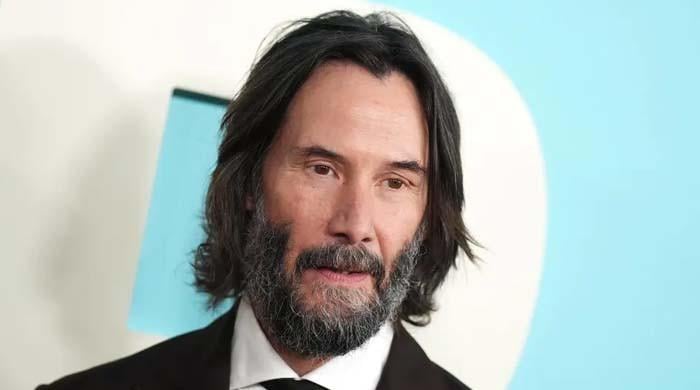 Keanu Reeves admits he uses motorcycles ‘to tell stories’ around the world