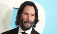 Keanu Reeves admits he uses motorcycles ‘to tell stories’ around the world