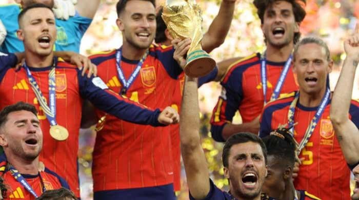 King and his family welcome Spain's football team after World Cup victory