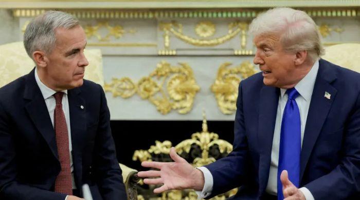 Mark Carney responds after Trump imposes 50% tariffs on Canadian goods 