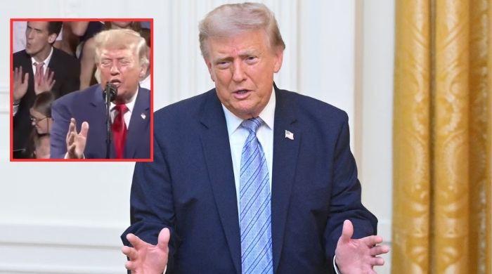 Man behind Trump goes viral for mimicking his every move during Georgia speech
