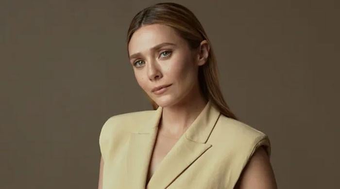 Elizabeth Olsen melts hearts with rare public appearance with newborn baby