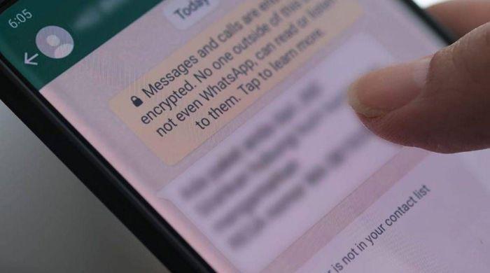 WhatsApp tests AI tool that flags scam chats on-device