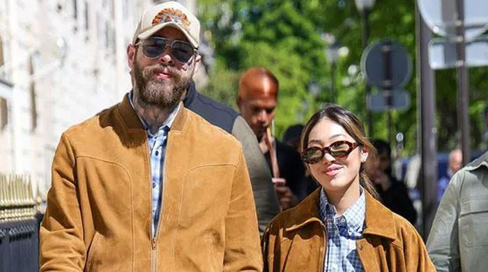 Post Malone pops the question to Christy Lee