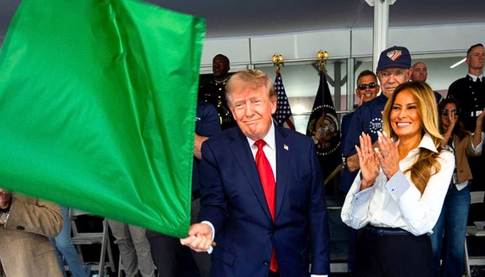 Trumps energetic flag wave at D.C. IndyCar race draws memes and criticism