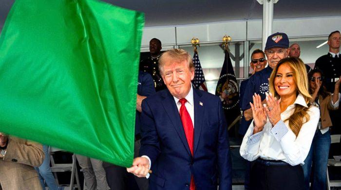 Trump’s viral IndyCar flag wave: Memes, criticism, and iconic political moments