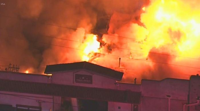 Newhall Refinery destroyed as major fire spreads through Old Town Newhall