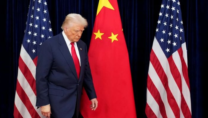 US lawmakers urge Trump to bar Americans from aiding Chinese security agencies