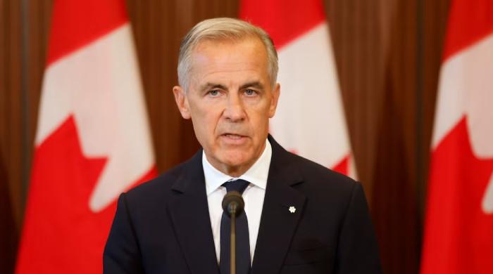 Carney rejects US trade demands over French language as Trump threatens new tariffs