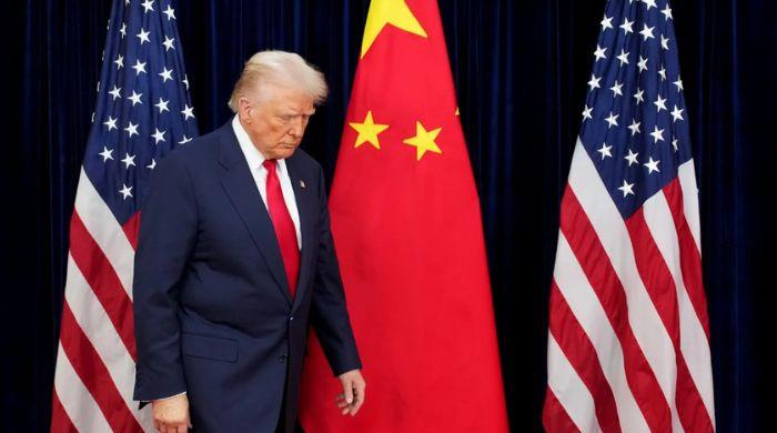 US lawmakers urge Trump to bar Americans from aiding Chinese security agencies