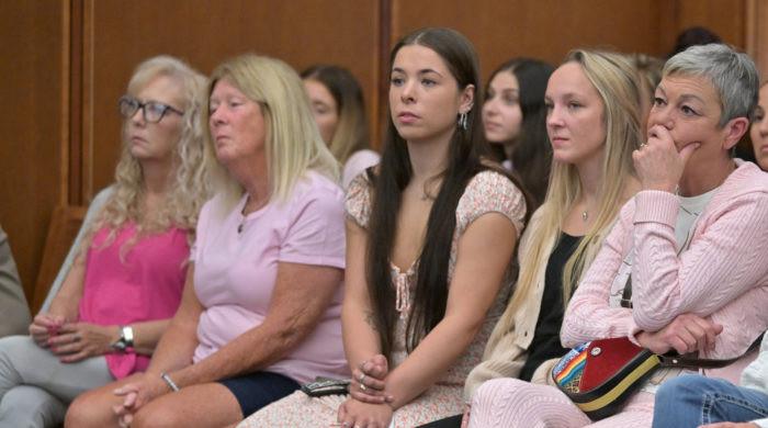 Lindsay Clancy and reporter behind 'creepy' courtroom grin share surprising connection