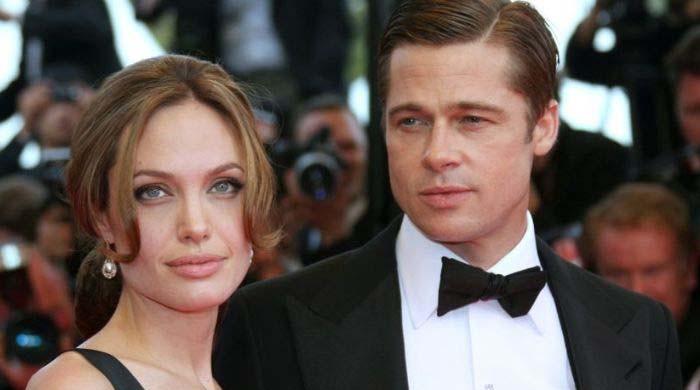 Angelina Jolie feels 'stronger' as Brad Pitt feels the heat