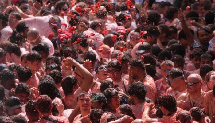 La Tomatina 2026: Thousands of revelers paint Spain red in 120-ton tomato fight
