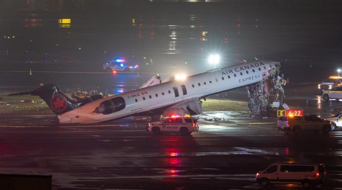 LaGuardia Air Canada crash: controllers allegedly left tower early before collision