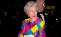 Queen Elizabeth II's unseen 1971 corgi snap reveals her off-duty style