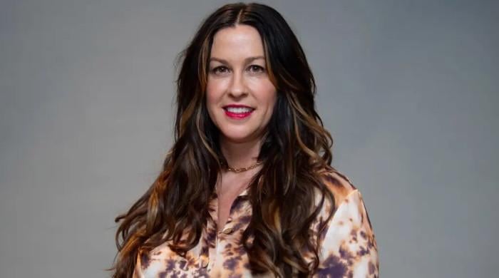 Alanis Morissette sues ex-manager for extortion