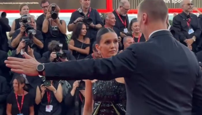 Nina being gestured by security at the Venice International Film Festival