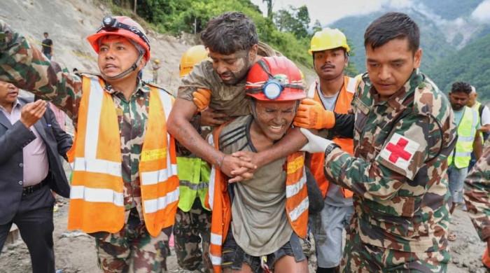 Nepal floods: workers found alive underground after 9 days as rescue continues