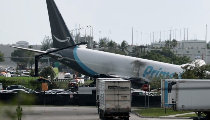 Miami airport crash: five victims killed were in a cleaning van and SUV, NTSB says
