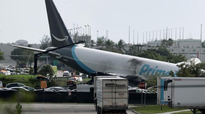 Miami airport crash: five victims killed were in a cleaning van and SUV, NTSB says
